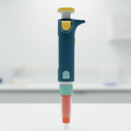 Precision micropipette with ergonomic grip